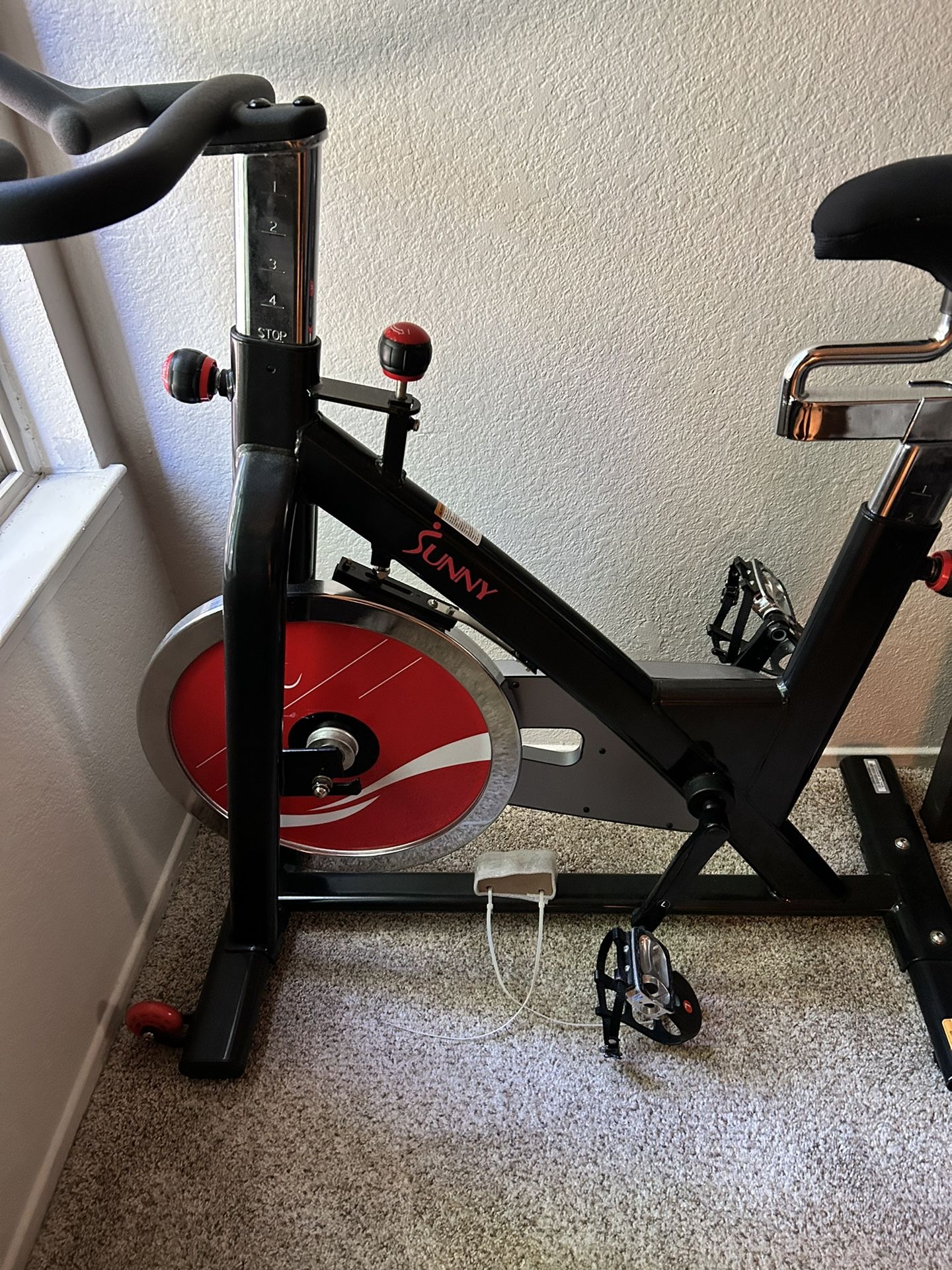Sunny Health & Fitness Premium Indoor Cycling Exercise Bike with Clip-In Pedals - SF-B1509/C