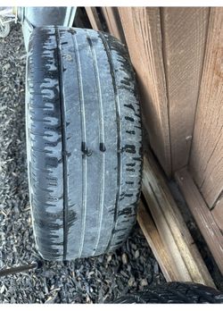Nissan Rim Good For A Spare Still Holds Air 30% tread left Price Is With Rim
