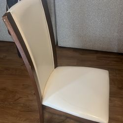 Glass table with 4 chairs