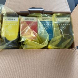 four high-yield toner cartridges compatible with Lexmark C2325 series printers. 