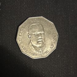 Jamaican 50 Cents coin featuring Marcus Garvey.  