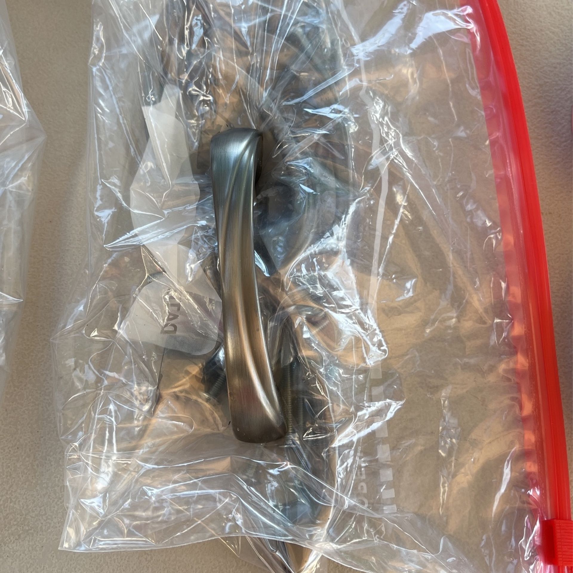 Cabinet Stainless Steel Look Handles For a Full Kitchen.