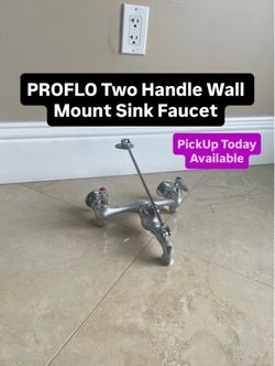PROFLO Two Handle Wall Mount Sink Faucet (NEED GONE ASAP)