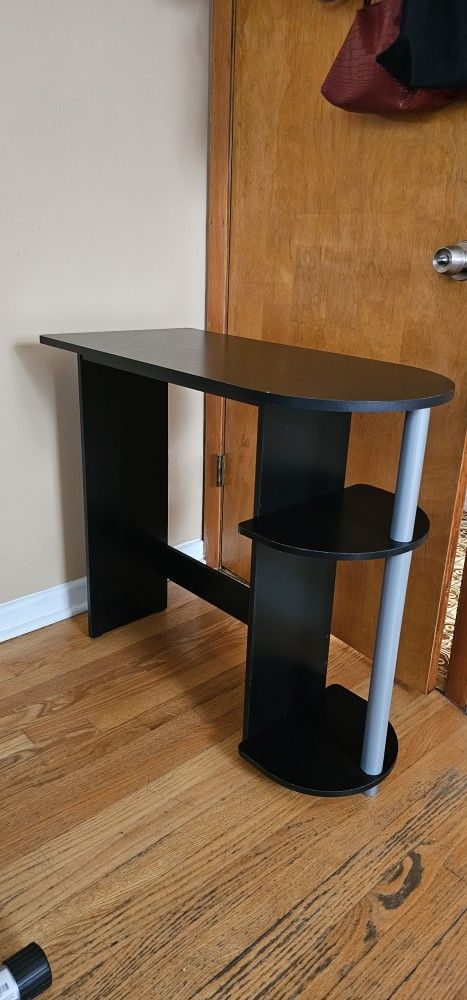 Computer desk with built-in shelves
