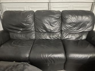 Black leather reclining couch