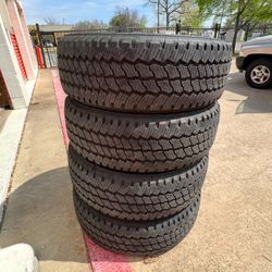 LT275/65/R20 Bridgestone dueler all-terrain 10 ply load range E Chevy Gmc Ford Rims
