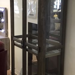 Two glass door curio cabinet