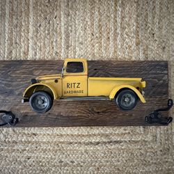 vintage Ritz Hardware metal replica toy truck hanging rack