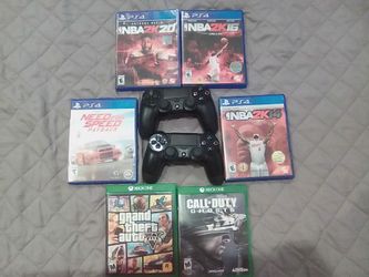 Two PS4 wireless controllers and four PS4 games and two Xbox one games