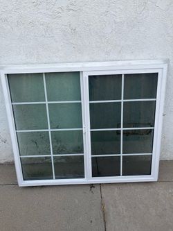NEW - Retrofit window 55 3/4 x 45 1/2