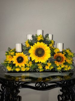 Candelabros grandes con girasoles
