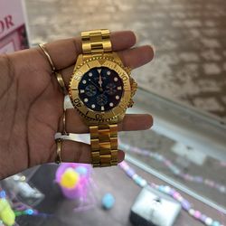Gold invicta watch
