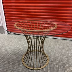 Round glass table gold accents