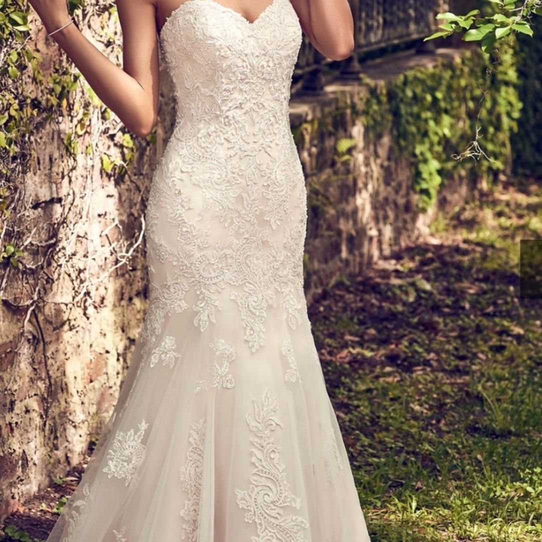 bustling a mermaid wedding dress Bride's Guide: How To Bustle Your Wedding Dress