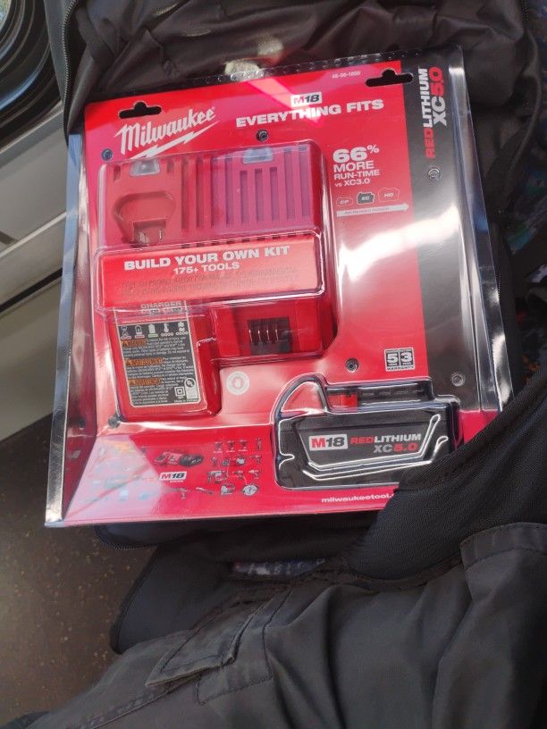 Milwaukee M18 Red Lithium Xc 5.0 Battery And Charger