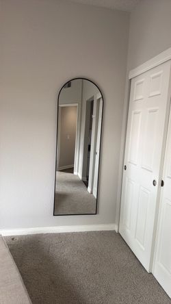 Full length arched mirror