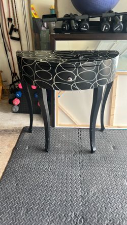 Half moon entry way table.