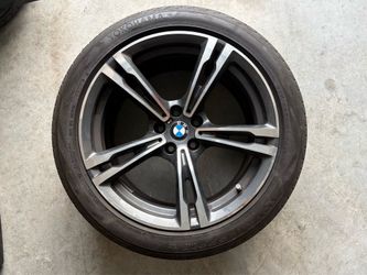 Set of BMW 19” Style 705M wheels with mounted tires.