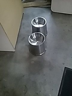 TWO TALL STAINLESS STEEL CONTAINERS
