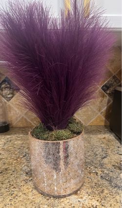 Mirrored Glass and purple feather decor