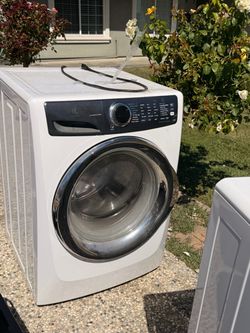 Electrolux LuxCare Front Load Washing Machine and electric dryer