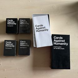 Cards Against Humanity Full Deck, Along With Four Additional Expansion Packs