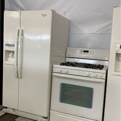Refrigerator and Stove gas stove made by Kenmore refrigerator made by Whirlpool