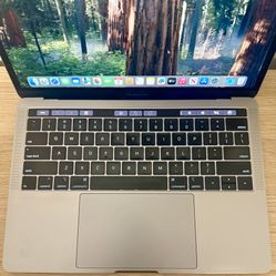 MacBook Pro  (2019) – Touch Bar- Great for a friend 🎄