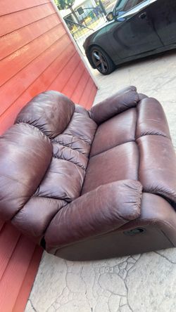Leather loveseat both recline