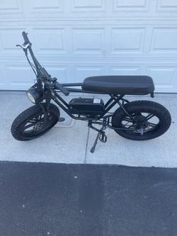 Black ebike around 75-100lbs