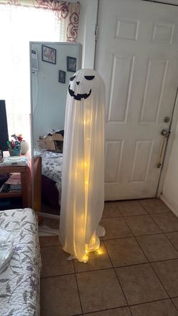 Outdoor ghost decor with lights