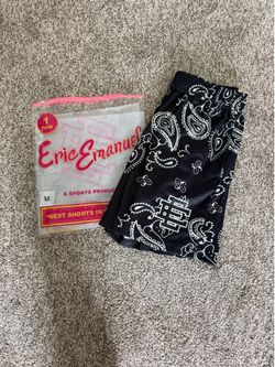 Eric Emanuel Paisley Shorts feature a breathable black mesh fabric with a distinct white bandana pattern. Size medium.