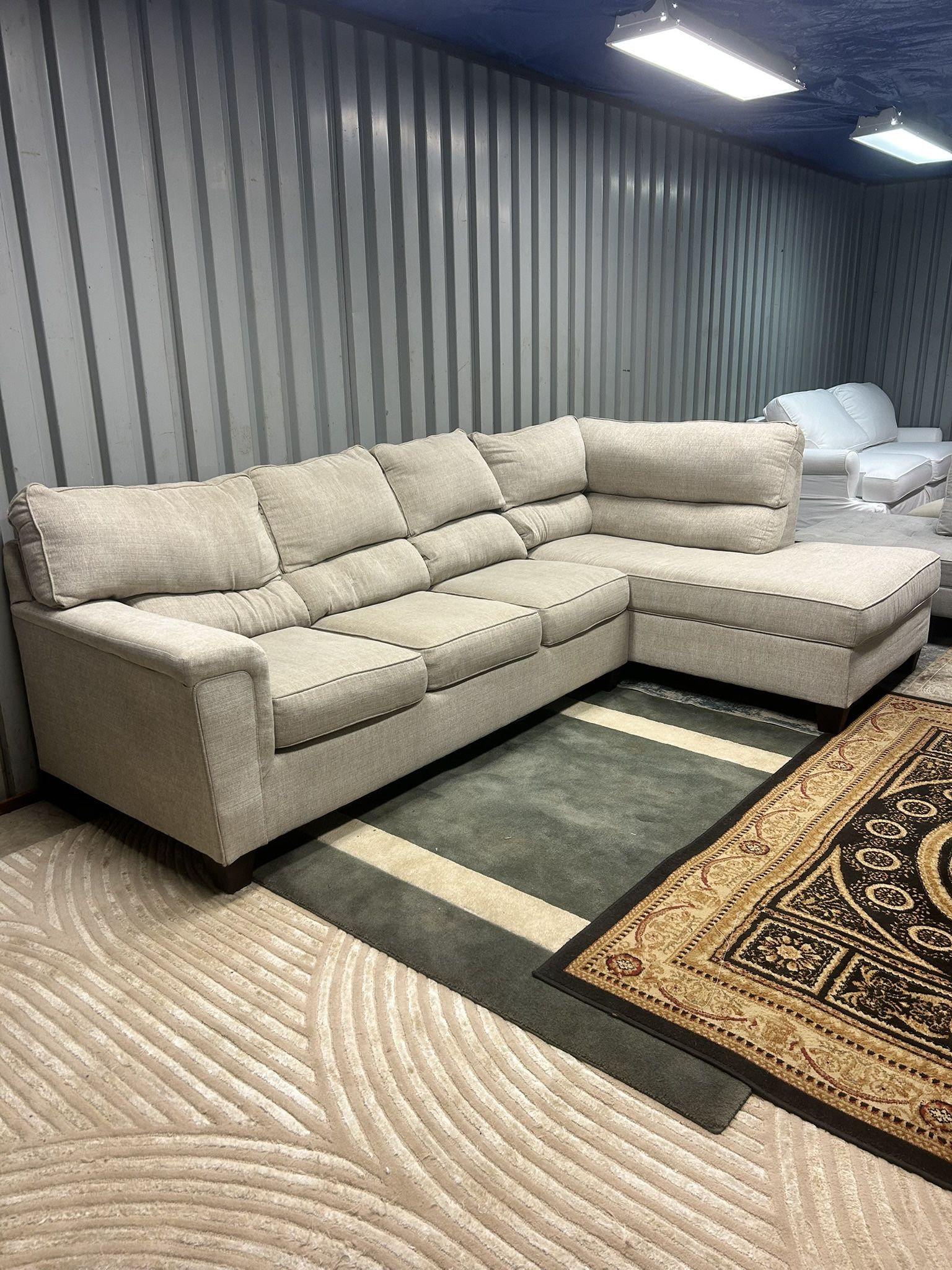 Ashley Beige 2p Sectional (Pick-up Only)