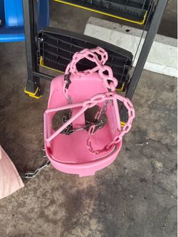 Pink toddler swing