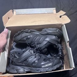 Shattered backboard 1s and Balenciaga triple black tracks