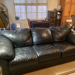 Black Leather Sleeper Couch And Matching Chair