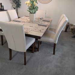 Solid wood table 6 chairs and center piece