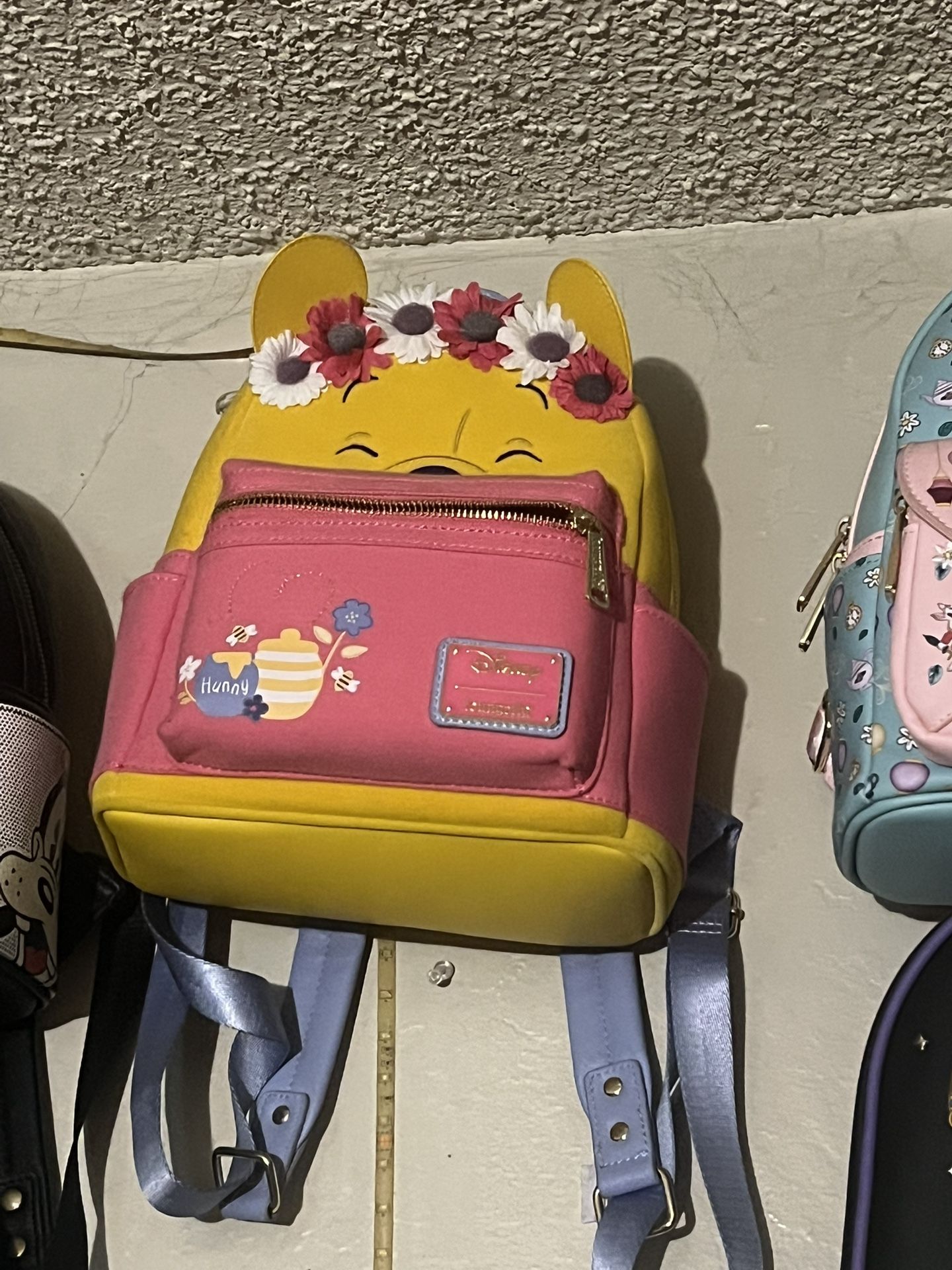 Different Disney bags going for 70 each