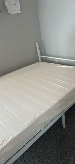 Bed with mattress