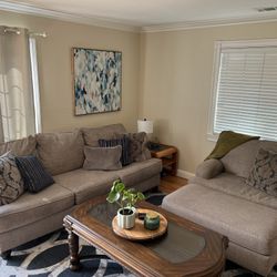 Couch and large chair with ottoman + Coffee Table + Rug