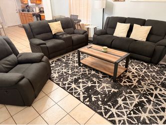Three living room couches
