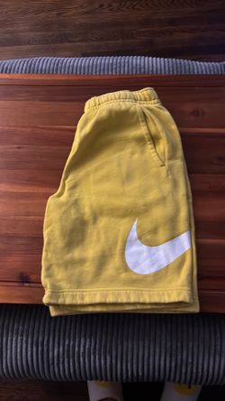 Nike Yellow swoosh shorts