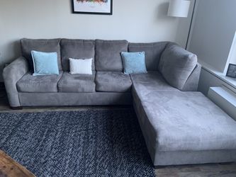 Gray Zella Ashley HomeStores Sectional Sofa (Rightside Chaise)