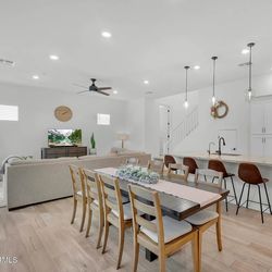 8-Person Extendable Wood Dining Table With 8 Chairs