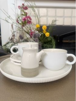 2 coffee cups saucers 1 plate and lil creamer