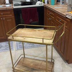 Two tier wood and gold bar cart