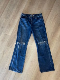 Jeans size 11 female, loose fit around the legs, long