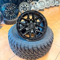 17" 6x135 Ford Rims And Tires 33/1250/17 MT