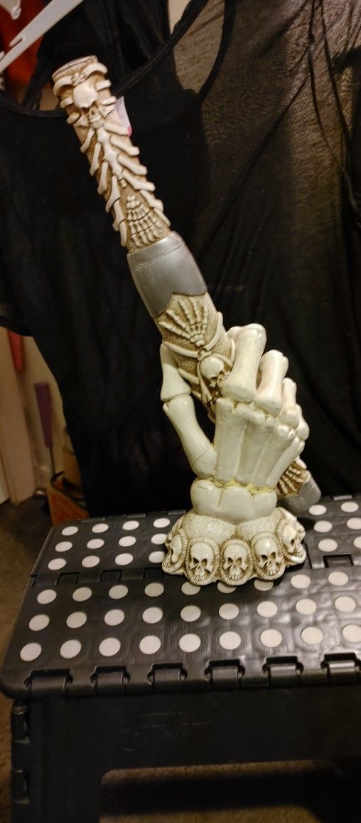 Skeleton Hand Holding Skull Knife Decoration