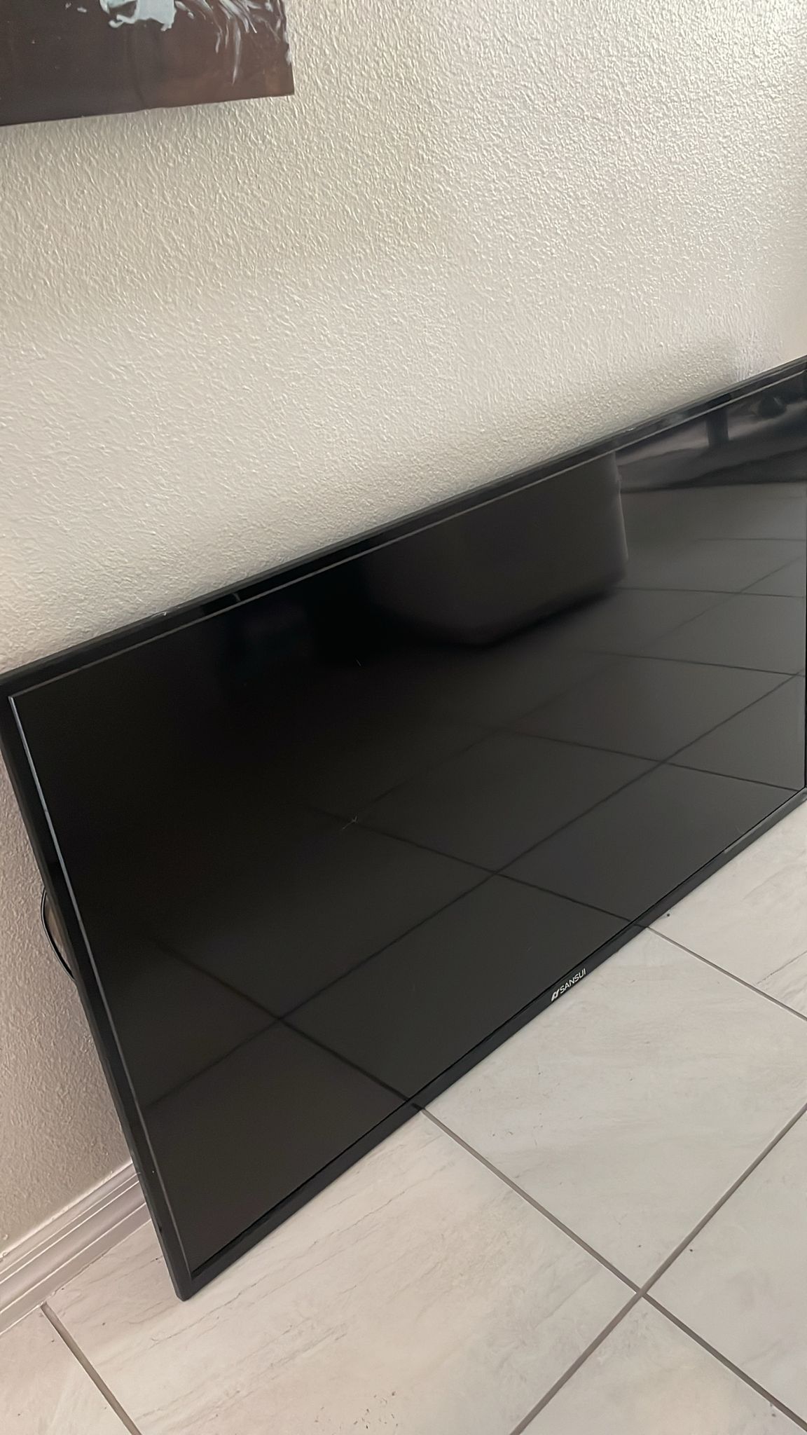 TV 55” It's not a smart TV, it works with Roku
